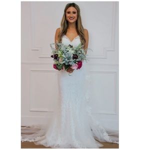 Brand new wedding dress with tags size 2